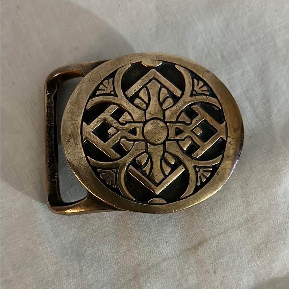 Intricate Gold and Black Belt Buckle